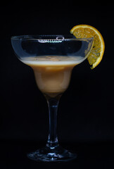 glass of liqueur with berries