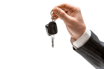 Concept of selling or renting a car. Hand of man in formal suit holding car keys on isolated...