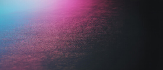 Fototapeta premium Abstract gradient background with textured surface and pink and blue color tones