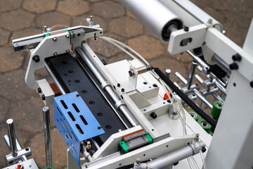 Industrial Component Assembly with Rollers, Wiring and Perforated Shield &ndash; Automation System Detail