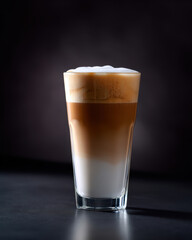 Delicious layered coffee served in a glass