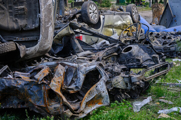 Fototapeta premium car destroyed by fire in Kyiv