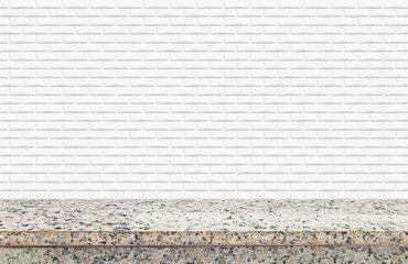 Granite stone countertop with white brick wall background, ideal for product mockup, advertisement,...