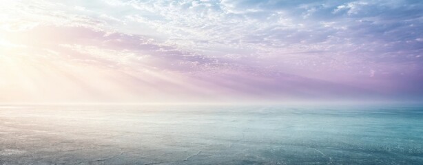 Serene ocean horizon under a dreamy sky with sunbeams and pastel clouds