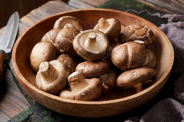 Fresh Shiitake Mushrooms on Wooden Surface for Healthy Cooking and Plant-Based Meals