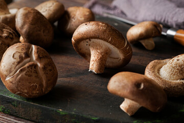 Fresh Shiitake Mushrooms on Wooden Surface for Healthy Cooking and Plant-Based Meals