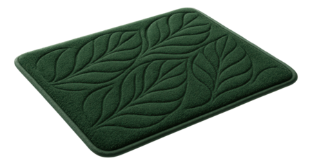 A mat with a leaf motif and anti-slip properties, enhancing the natural theme of a garden-view bathroom.