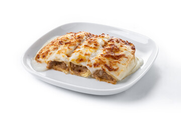 Baked Cannelloni with Cheese and Béchamel Sauce isolated on white background