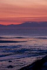 Pastel Sunset Over a Frozen Winter Sea