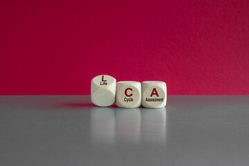 Life Cycle Assessment symbol. Concept words LCA Life Cycle Assessment on wooden cubes. Beautiful...