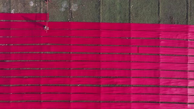 Aerial view of vibrant textile patterns in field, Bangladesh.