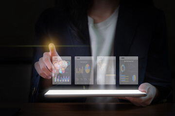 Close-Up Image of a Businesswoman's Hand Using a Digital Tablet.