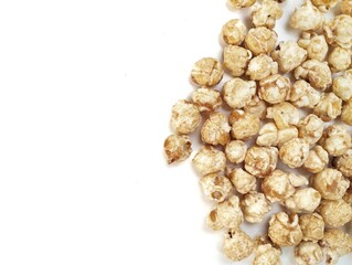 Pile of pop corn on white background with copy space 
