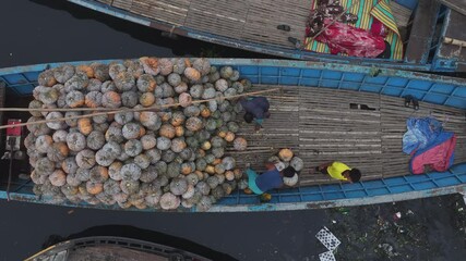 Dhaka, Bangladesh - 01 March 2025: Aerial view of fishing boats on Buriganga River, Bangladesh.