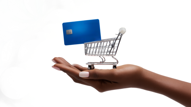 shopping cart on a blue debit card carefully placed on the open hand of a  female palm 