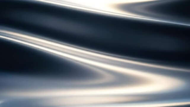 Abstract metallic silver texture with smooth lines, glossy surface, and flowing pattern.