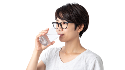 Refreshing drink scene woman drinking water minimalist studio lifestyle focus bright environment close-up perspective