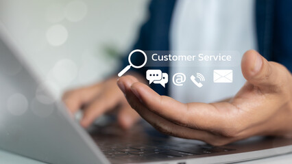 searching for customer service options on a laptop with digital support icons for chat, email,...