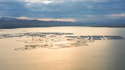 Aerial View of Fish Pens on a Lake