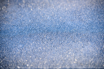 Close-Up of Morning Frost Crystals on Metal Surface Outdoors