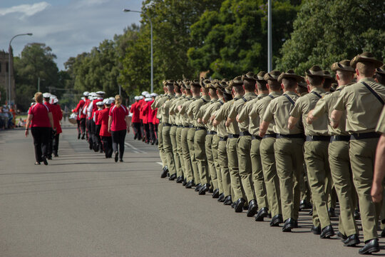 Soldiers and town band marching on ANZAC Day