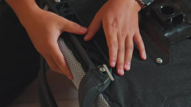 Hands Assembling Furniture with Focus