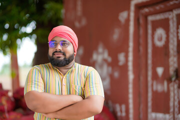 indian farmer standing confidently