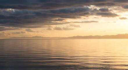 Golden Hour Sunset over Calm Ocean Serene Landscape Photography