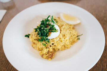 Kedgeree with smoked fish, poached egg, lemon at New Zealand Cafe