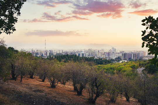 Timelapse scenic Tajikistan capital Dushanbe panorama from popular hilltop Victory park viewpoint with Tv tower, landmarks, buildings, real estate property development site