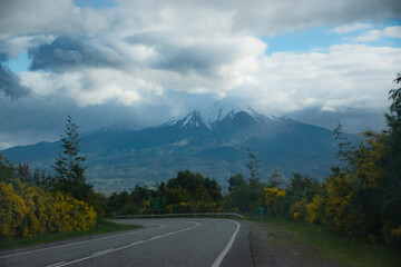 road in the mountains with volcano