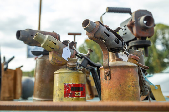 A collection of vintage blow torches