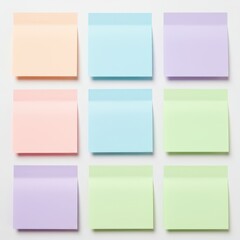 Fototapeta premium Nine pastel sticky notes arranged in a three-by-three grid on a white background, great for reminders or bullet journaling.