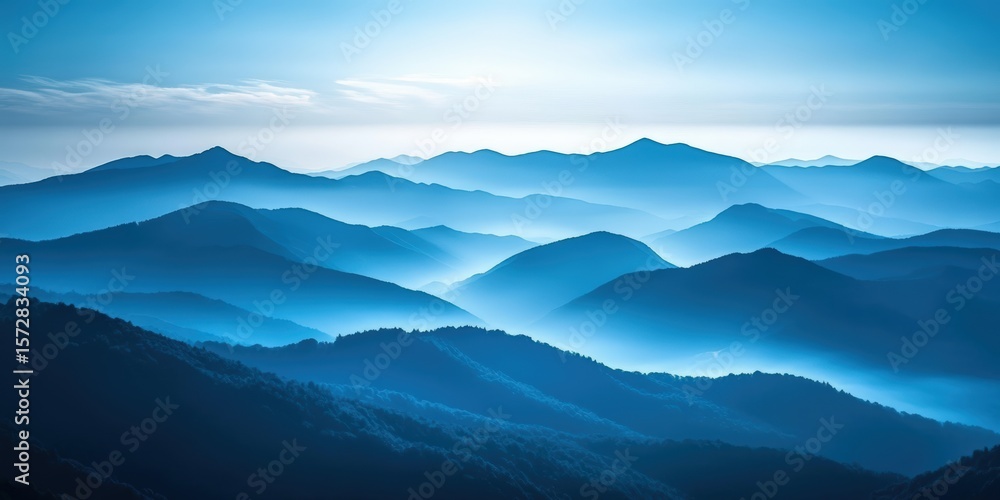 Poster a serene landscape of layered blue mountain ranges under a clear sky with soft clouds, creating a pe