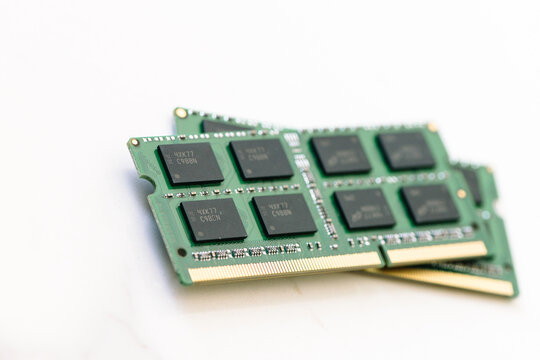 Two memory boards for a computer on white
