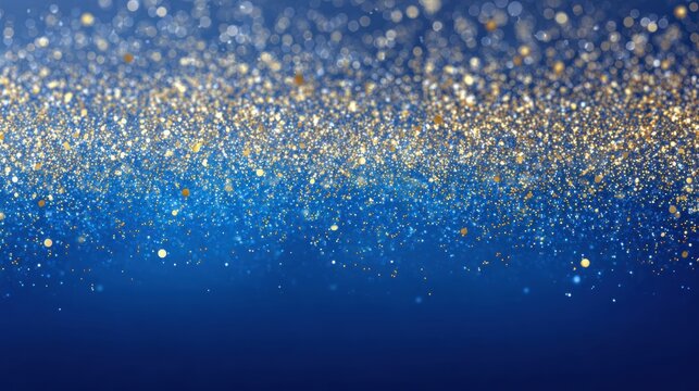 Close-up of a vibrant blue background sprinkled with shimmering gold glitter particles.
