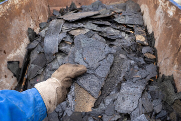 Dispose of old removed roofing felt and place in waste container