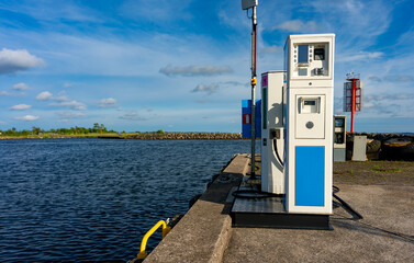 Boat fuel station with gasoline and diesel pumps.