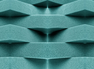 green foam material arranged transversely. overlapping pile	

