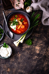 Traditional Ukrainian borsch with sour cream
