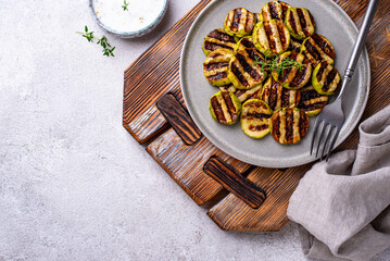 Grilled zucchini with garlic sauce