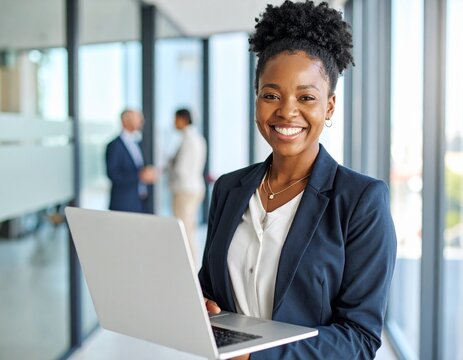 Portrait of smiling black businesswoman looking at camera