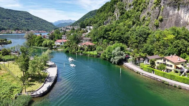Drone view at the canel between Switzerland and Italy  of Ponte Tresa in lake Lugano