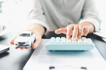 Sale agent deal to agreement successful car loan contract with customer and sign agreement contract...