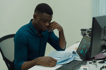Black engineers are programming in an academic classroom for learning