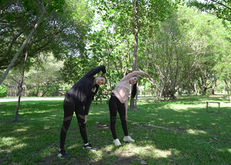 Female friends who are getting ready to run and stretch, exercise, run or enjoy nature with friends...