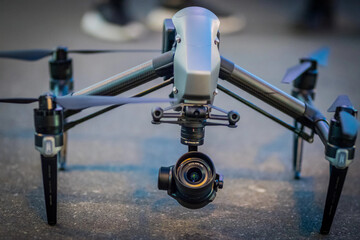 Drone lands on the street flying around city