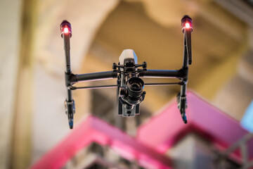 Drone lands on the street flying around city