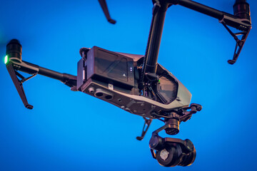 Drone lands on the street flying around city