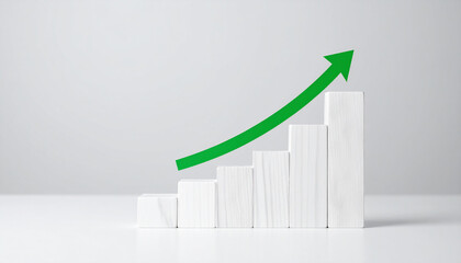 Minimalist white wood block graph with green arrow pointing upwards. Business and market growth